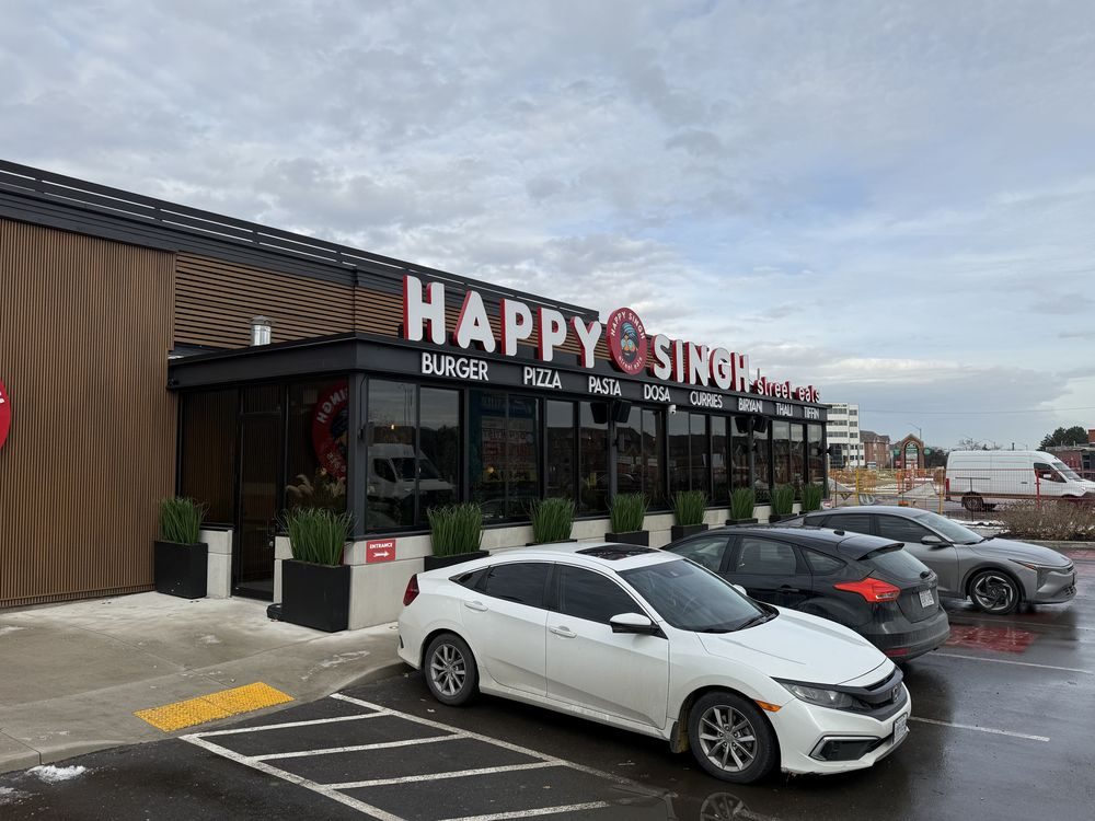 Glass-aluminum storefront installed for Happy Singh, Mississauga